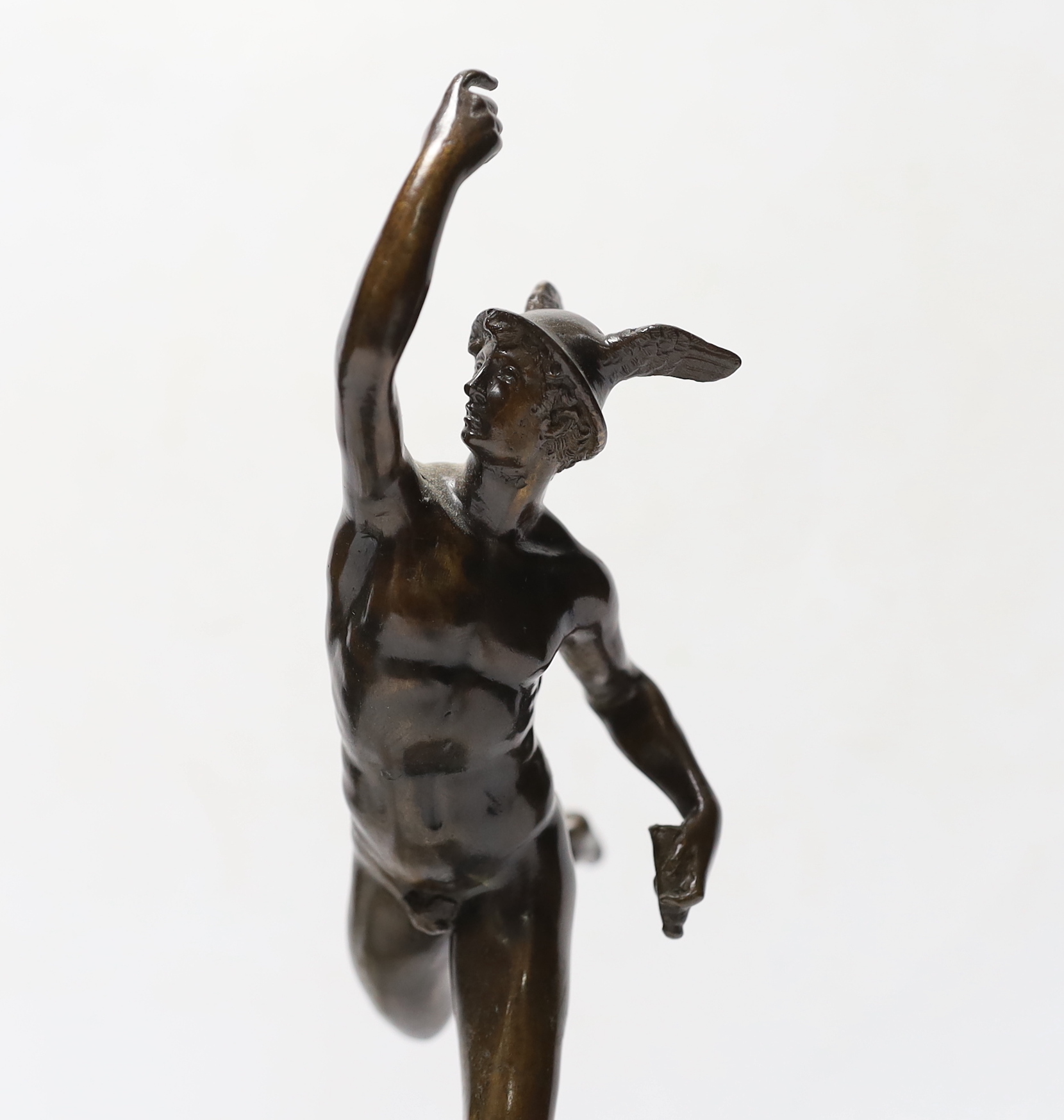 A small bronze model of Hermes, after the Antique, together with a small tazza with cast brass female nude, bronze 27cm (2)